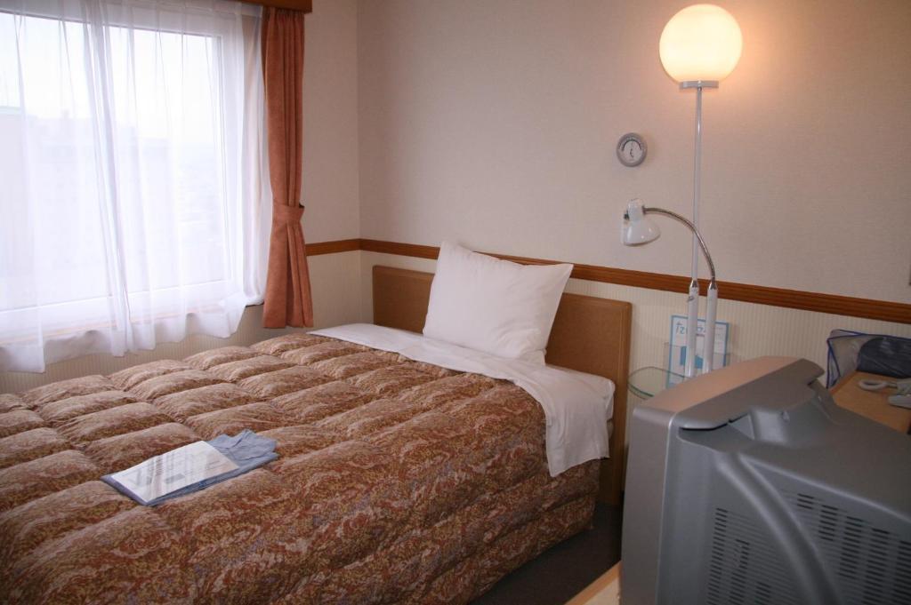 Toyoko Inn Hirosaki Ekimae Δωμάτιο φωτογραφία